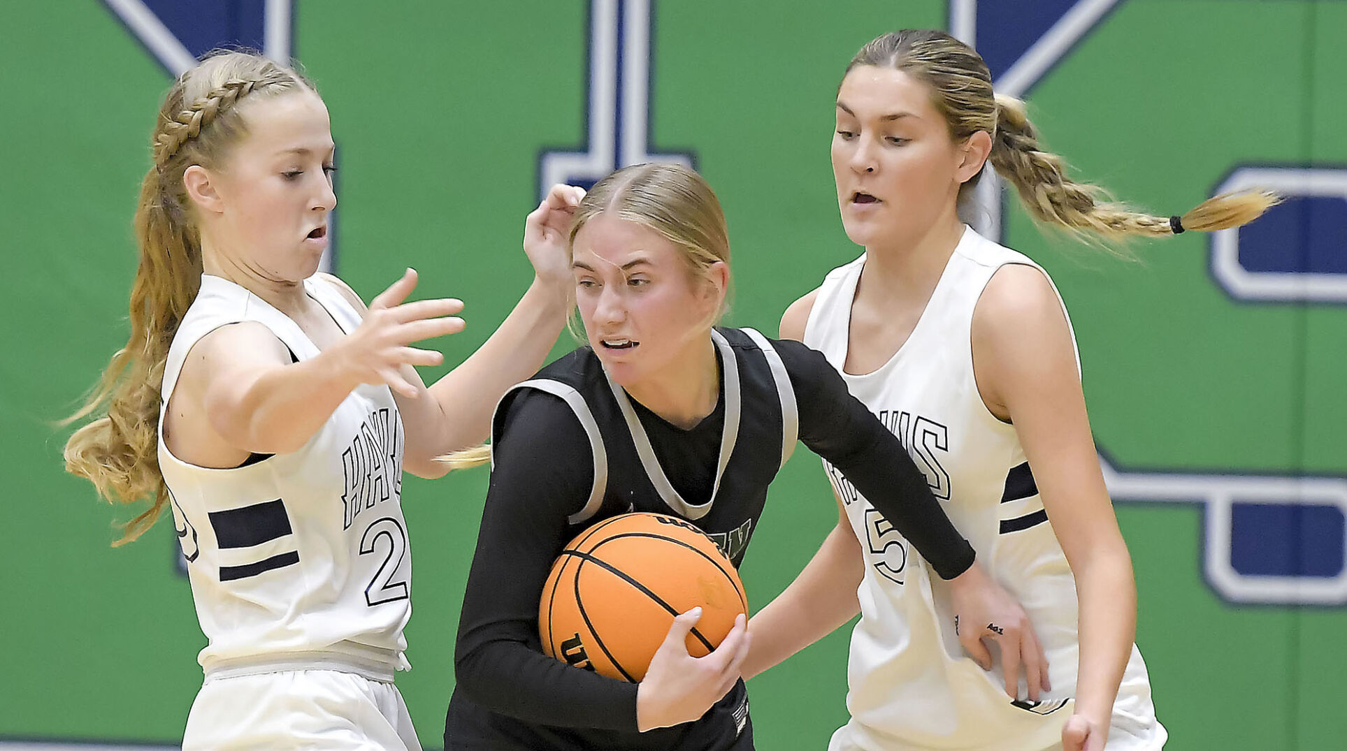 Prep girls hoops: Hawks hold off Wolves, improve to 13-0